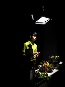 Man in Green Polo Shirt Standing thumbnail