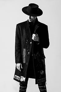 man wearing black long coat and black hair thumbnail