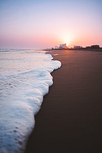 photo of seashore during golden hour thumbnail
