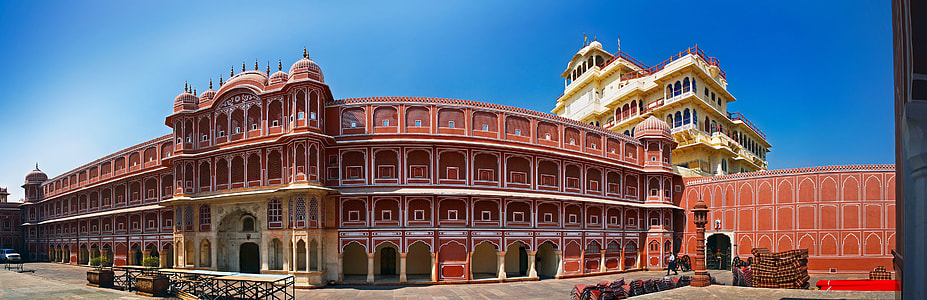 red concrete building under blue sky during daytime thumbnail