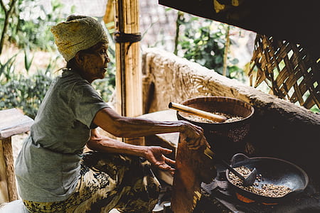 woman cooking food on frying pan thumbnail