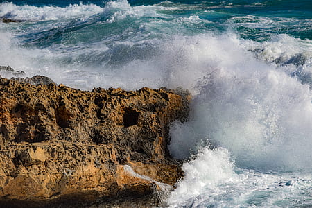 ocean waves crushing on cliff thumbnail