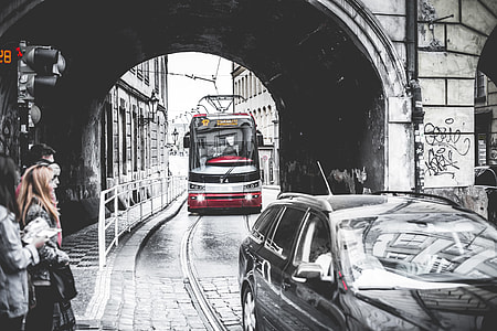 Tram Going Through The Tunnel Under The Bridge thumbnail