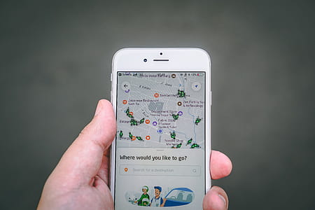 person holding silver iPhone 6 thumbnail