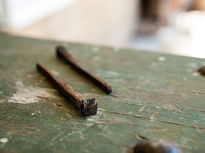 macro photography of two nails thumbnail
