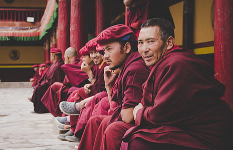 group of people sitting beside hallway thumbnail