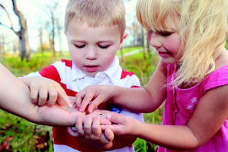 photography of boy and girl during daytime thumbnail