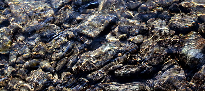 pile of gray black stones thumbnail