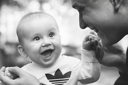 grayscale photo of baby wearing Adidas shirt thumbnail