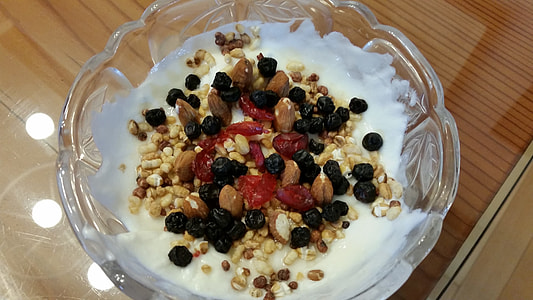 assorted nuts on white cream in glass bowl thumbnail