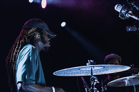 man wearing cup while playing drums thumbnail