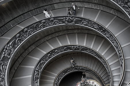 grayscale photography of people using the staircase thumbnail