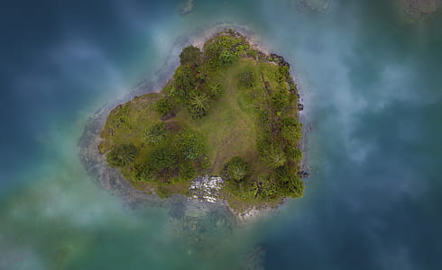 birds eye view photography of island thumbnail