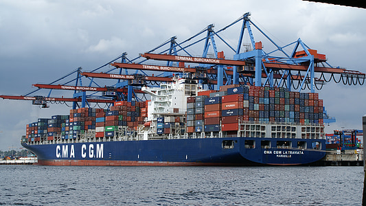 blue cargo ship on body of water thumbnail