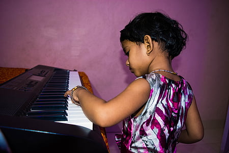 girl playing piano thumbnail