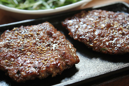 two meats on black iron cast plate thumbnail