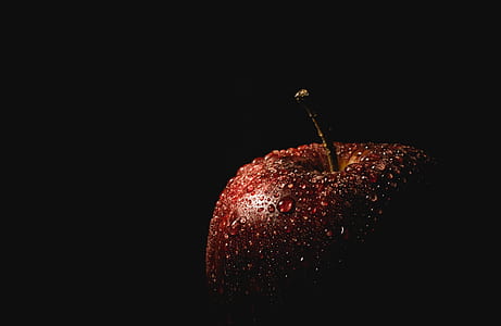 sweet apple on black surface thumbnail