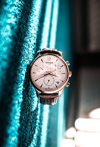 round gold-colored Tissot chronograph watch with brown leather strap at 4:40 thumbnail