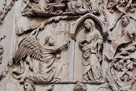 close-up of brown bas-relief thumbnail