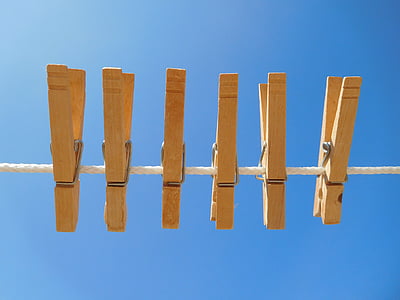six brown wooden clothes pins thumbnail