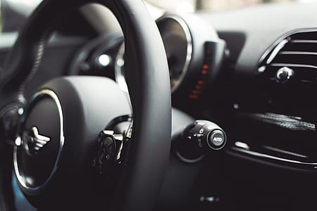 black car steering wheel thumbnail