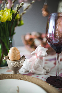 Easter table with cute pink decorations, flowers, catkins and eggs thumbnail