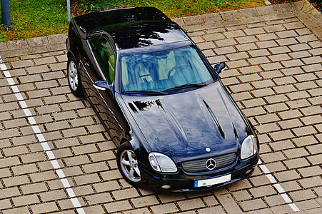blue Mercedes-Benz car parked on parking lot thumbnail