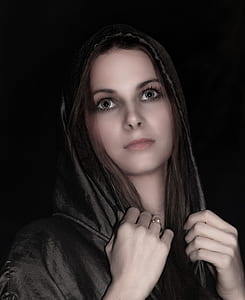 woman wearing black hooded apparel thumbnail
