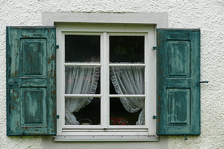 white and green wooden window thumbnail