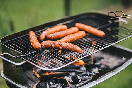 Pork and sausage on the grill thumbnail