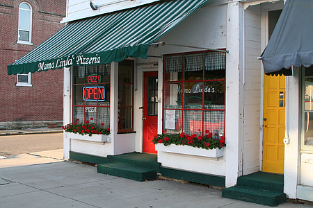 white store with green awning thumbnail
