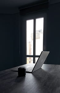 silver laptop computer on table thumbnail