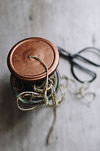 Thread in a jar and a paintbrush thumbnail