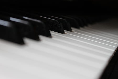 selective focus photography of piano keys thumbnail