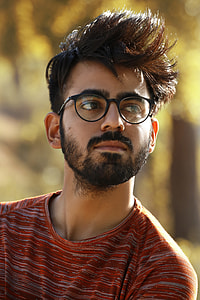 man wearing black-framed eyeglasses thumbnail