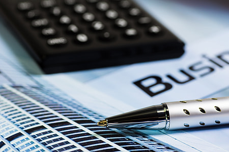selective focus photography of pen on book thumbnail