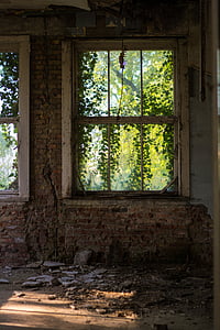 white framed window on brick wall thumbnail