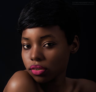 black haired woman photo thumbnail