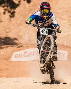 man riding mountain bike at daytime thumbnail