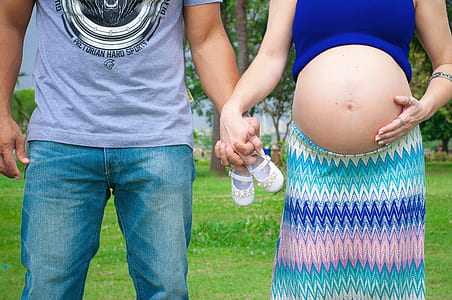 two persons holding hands thumbnail