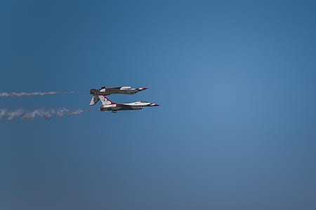 two jet plane on blue skies thumbnail