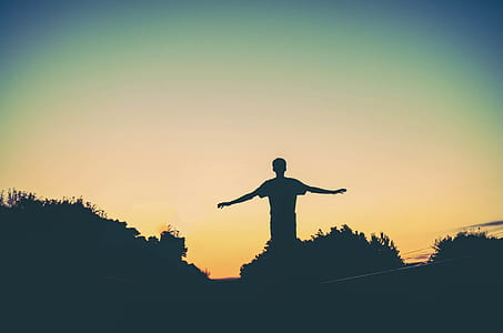 silhouette photography of a person thumbnail