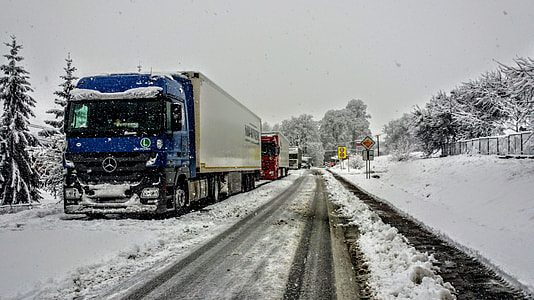 trailer truck on snow land thumbnail