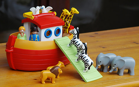 Noah's Ark toy set on top of brown surface thumbnail