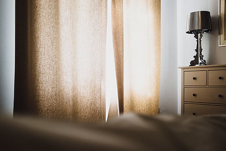 view of brown window curtain thumbnail