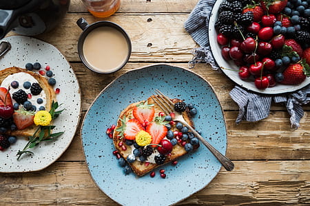 wheat bread with stawberry toppings on top of brown table thumbnail