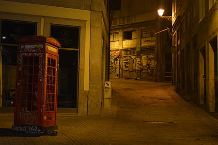 telephone booth beside pathway thumbnail