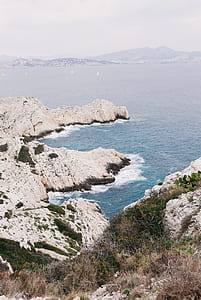 ocean near mountain thumbnail