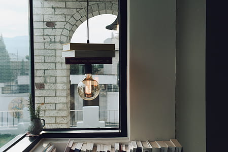 clear pendant lamp near glass window thumbnail
