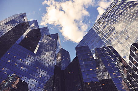 worm's-eye photography of glass building thumbnail